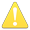 A triangle with rounded corners, containing an exclamation mark.