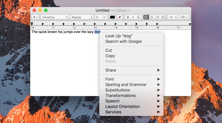 Screenshot of a document in which the word "dog" has been selected. A contextual menu appears next to the selection and includes items such as Look Up "dog", Cut, Copy, Share, and Services.